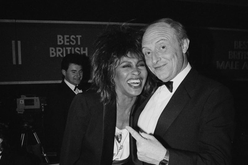 Labour Party leader Neil Kinnock with Tina Turner after the Brit Awards, at the Grosvenor House Hotel, on February 12, 1985. (Photo by D. Morrison/Express/Hulton Archive/Getty Images)