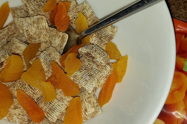 Get your kids eating more fruit by adding dry or fresh fruit to their breakfast cereal. Soft apricots cut into pieces, a handful of grapes or dried fruit;- sultanas, cranberries or trail mix, even some shelled monkey nuts.