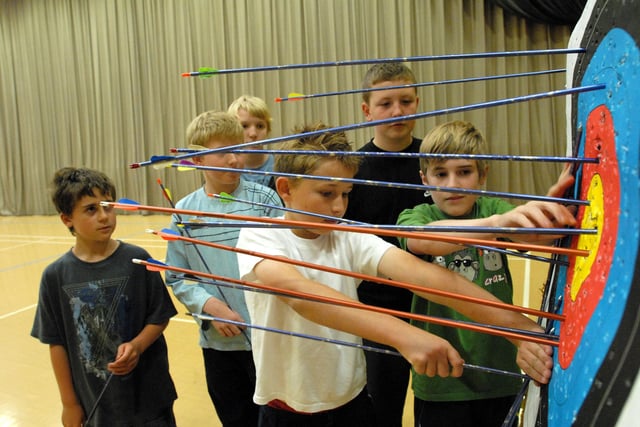 An archery course for youngsters got plenty of attention 14 years ago. Can you spot someone you know?