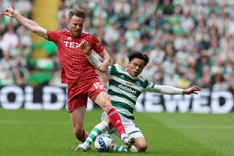 Marley Watkins of Aberdeen vies with Reo Hatate of Celtic in what was a five-star performance from the Hoops.