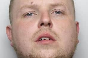 Thomas Garfitt, 29, was captured in hair-raising footage pulling off the dangerous manoeuvre on the A1, which connects London to Edinburgh.