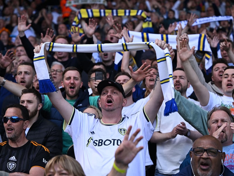 Leeds fans cheer on their team ahead of kick-off