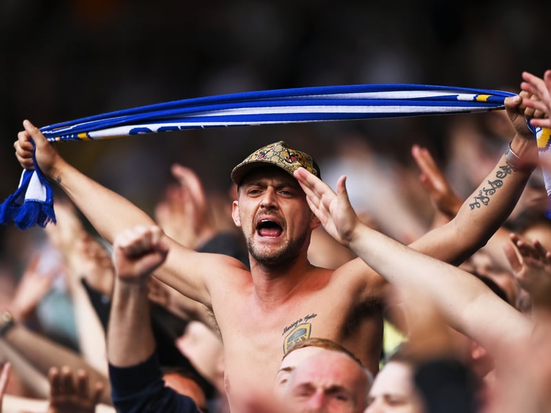 Leeds fans cheer on their team ahead of kick-off