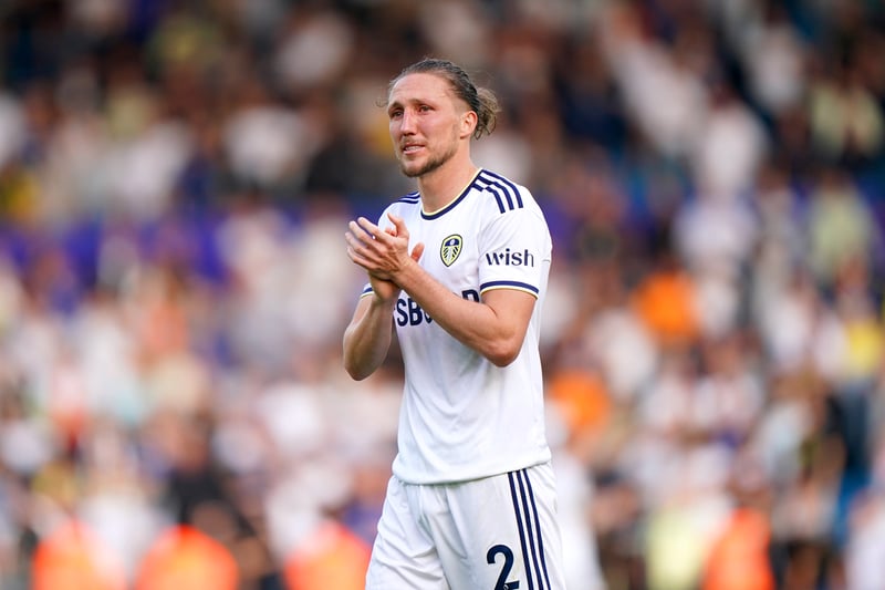 Luke Ayling applauds the fans at full time