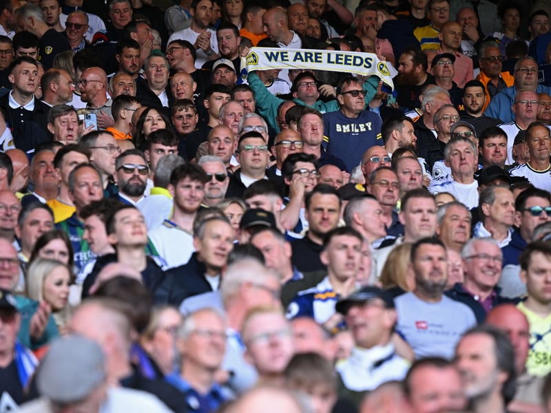 Leeds fans cheer on their team ahead of kick-off