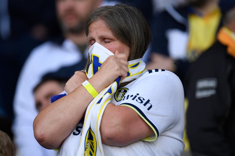 A Leeds fan reacts to the defeat 