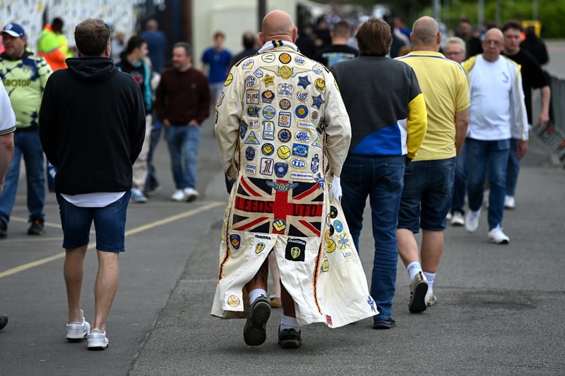 A Leeds United fan arrives at the stadium 