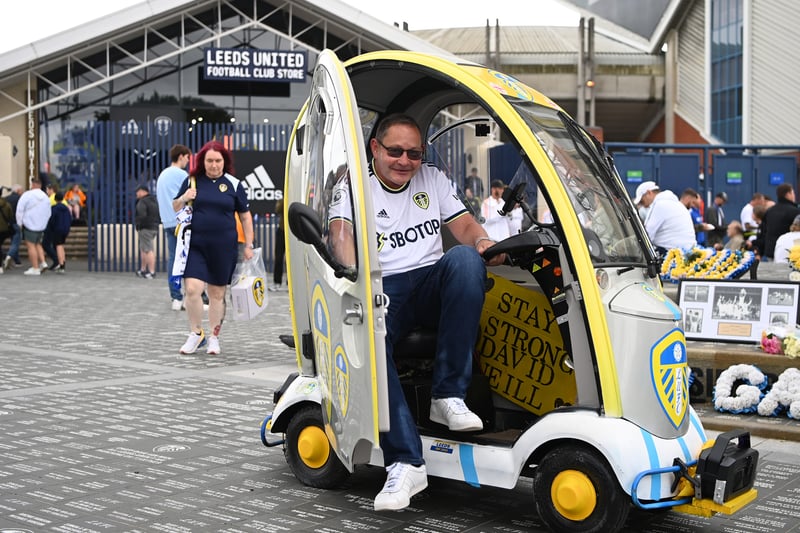 A Leeds United fan arrives in a modified scooter