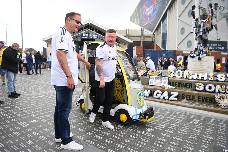 A Leeds United fan arrives in a modified scooter prior to kick off