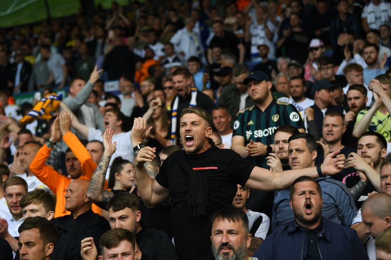 Leeds fans cheer on their team ahead of kick-off