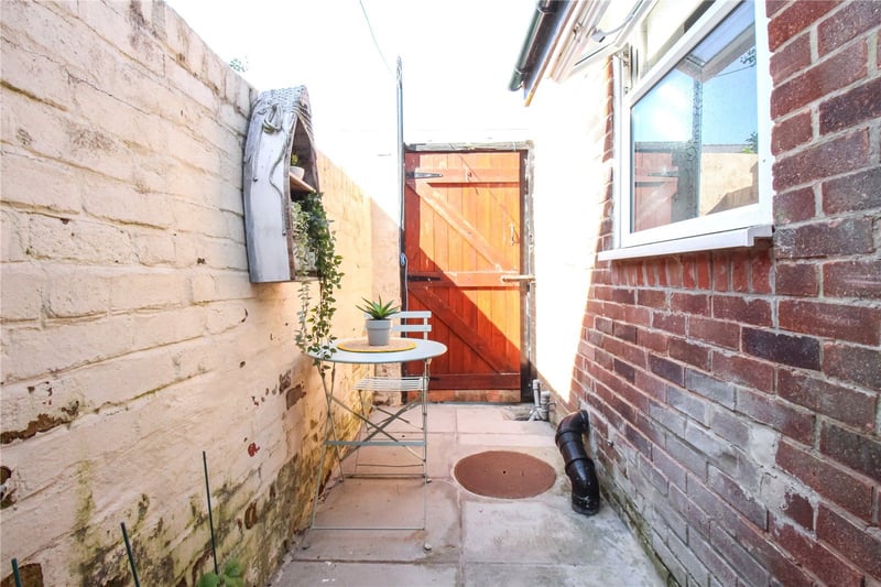 Externally, there is an enclosed yard perfect for growing potted plants and enjoying meals outside during the warmer months. The property also features on street parking.