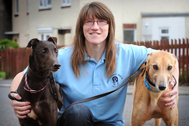 Sharon Morgan, volunteer at the Greyhound Rescue North East, pictured with 'Ruby' and 'Alfie' in 2012.