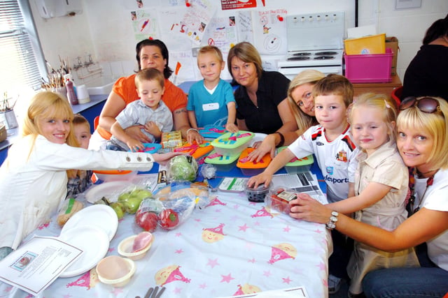 Flashback to 2008 when these people were making a healthy packed lunch for children at a Sure Start activity at Ropery Walk Primary School. 