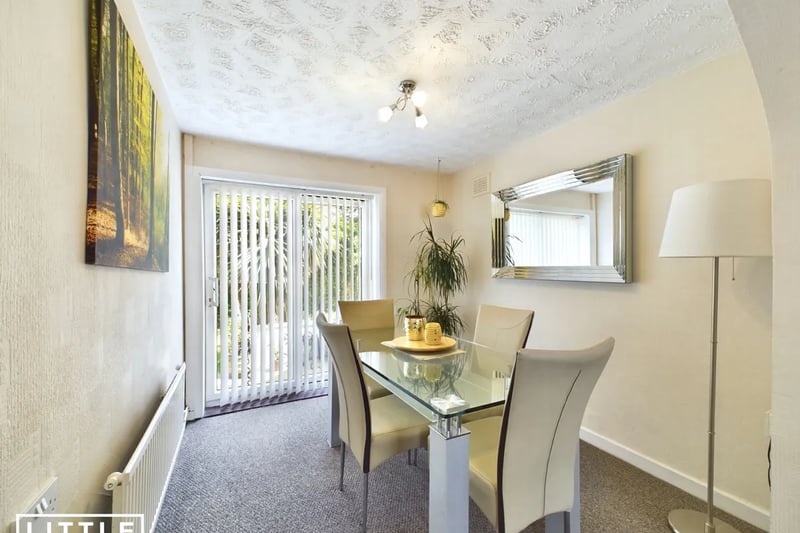 The light and bright dining room is perfect for entertaining or enjoying meals together as a family.