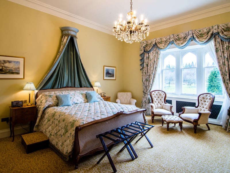 A stay in a Scottish castle is the kind of experience that many travellers dream about and Crossbasket has a small collection of rooms to transport you to a different age of hospitality. Accommodation includes the Lindsay Tower Suite with rooms spread across four-storeys of a 17th century castle tower, with views across the estate. Each room includes antique furnishings, rich fabrics, heavy curtains and deep carpets. 