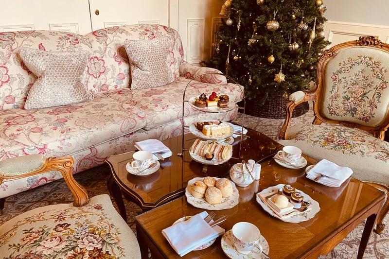 Afternoon tea in the lounge includes sandwiches, scones and cakes. 