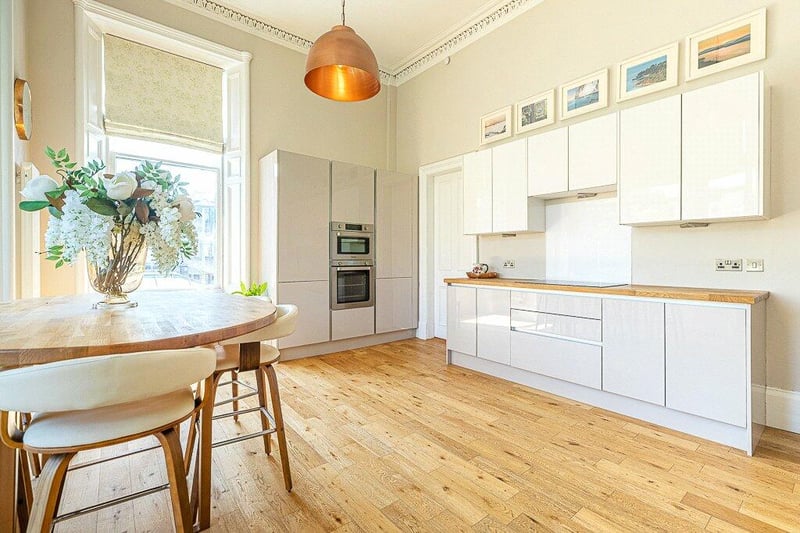 Fabulous dining kitchen with superb 3 section bay window to the side and further window to the rear.