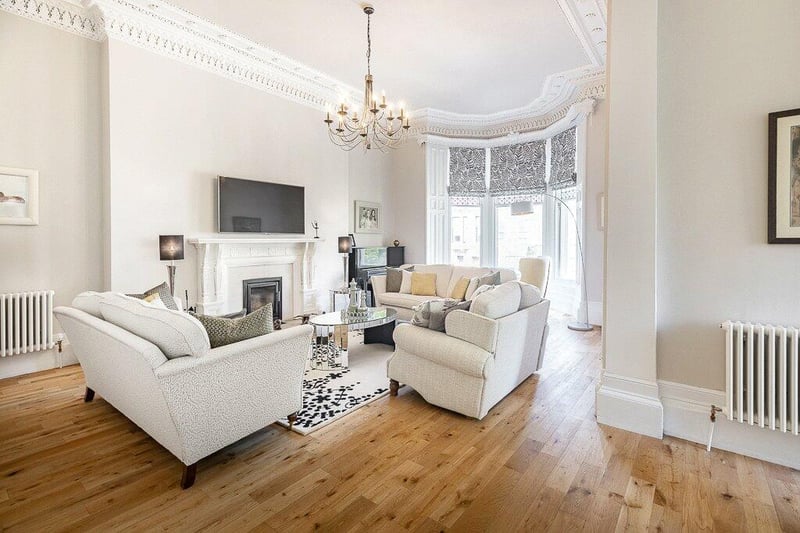The lovely, spacious family sitting room to rear with double windows,