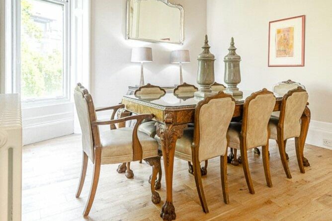 The spacious dining area would be a great place to host guests for a dinner party. 