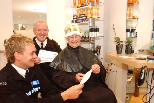 PC John  Dixon and Insp Steve Blackston were handing out leaflets at Fusion hairdressers in Frederick Street in 2005.