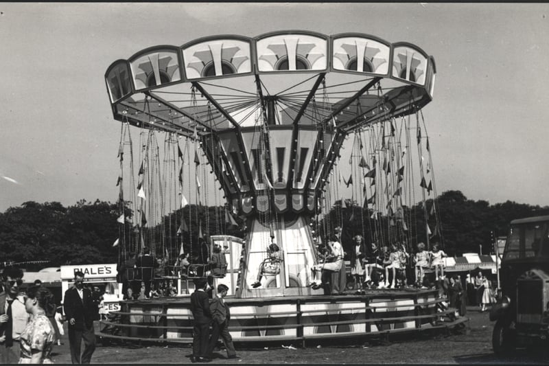 People enjoying themselves on the swing ride held at the Hoppings fair in Newcastle. 1940's
