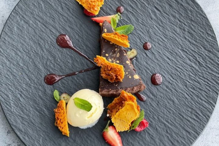 One of the many desserts to choose from at the restaurant is the dark chocolate and caramel torte. 