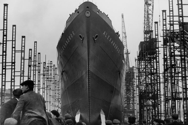 View of the cargo ship 'Alexandros' as she is launched at the shipyard of John Readhead & Sons Ltd, South Shields, 11 November 1958 