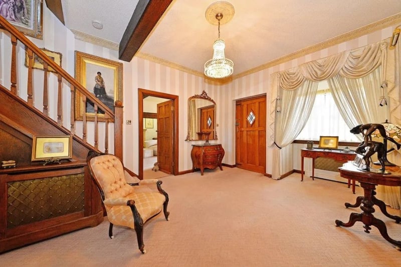 The entrance hall to the home is large with plenty of space for welcoming guests