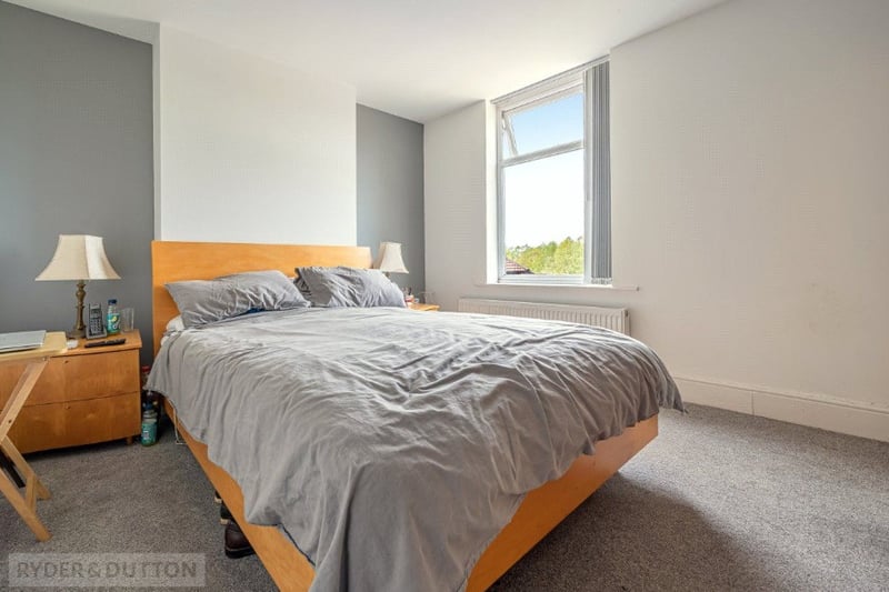 The first bedroom is incredibly spacious and benefits from lots of natural light