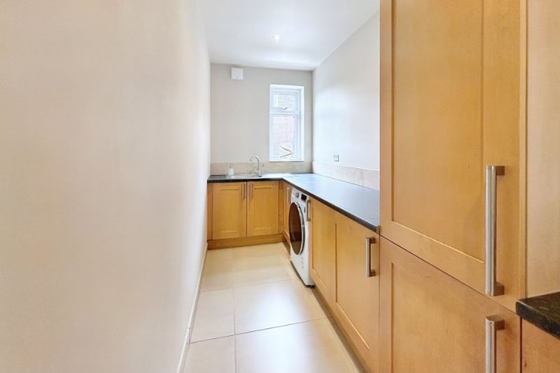 The property has a utility room that is perfect for a washing machine and tumble dryer