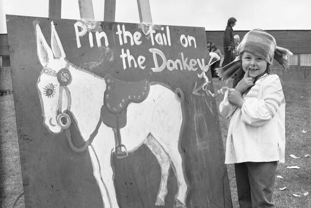 It's a 'pin the tail on the donkey' competition and this competitor was having fun in 1974 at Barmston Carnival.