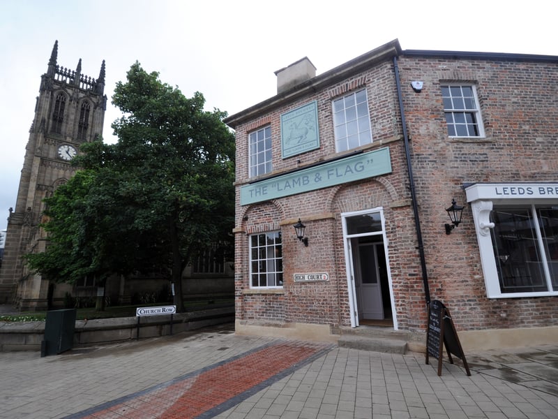 The Lamb and Flag's beer garden is tucked away in an alley with views of the next door Leeds Minster.