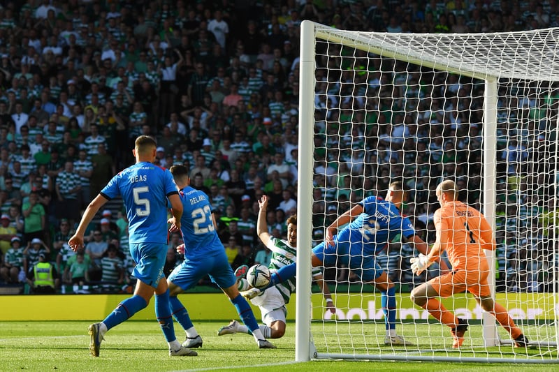 Celtic star Jota slots home to give the Parkhead side a two-goal cushion in the closing stages