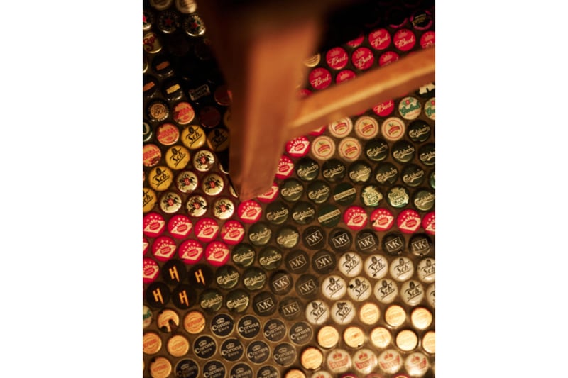 And the bar’s floor is made from bottlecaps, laid in a distinctive zig-zag pattern inspired by David Bowie’s Aladdin Sane album cover.