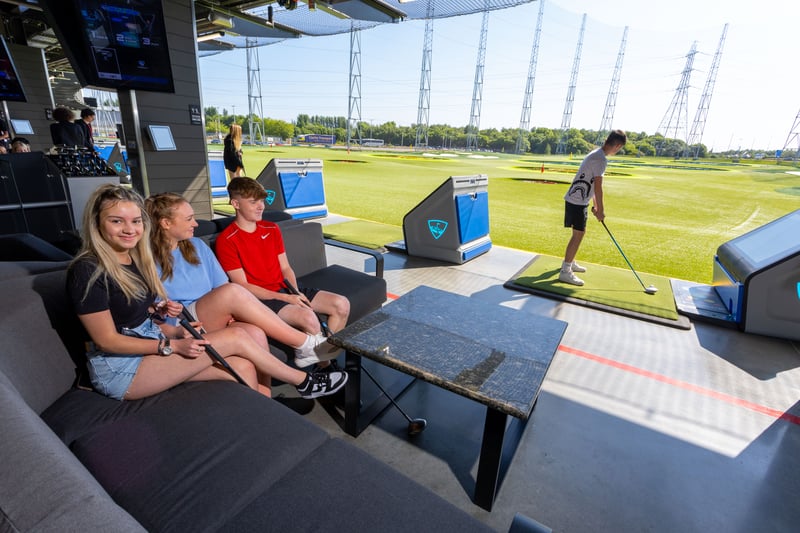 No matter what the weather is like, relax in the climate-controlled hitting bays for year-round comfort with HDTVs in every bay and throughout our sports bar and restaurant. Using our complimentary clubs or your own, take aim at the giant outfield targets and our high-tech balls will score themselves
