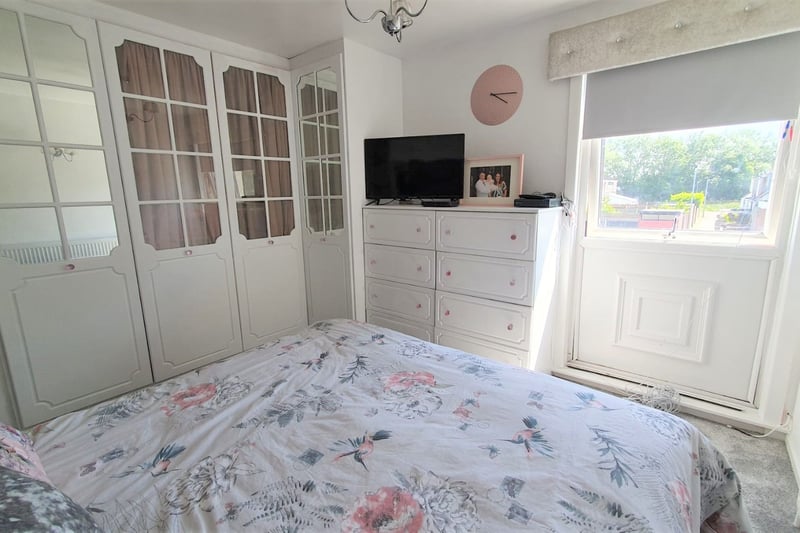 The property boasts three bedrooms upstairs including this double bedroom.
