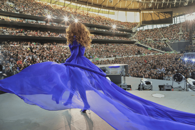 The singer wowed London crowds on her opening performance in the city as she showed off a new blue floaty dress that was designed by Roksanda.