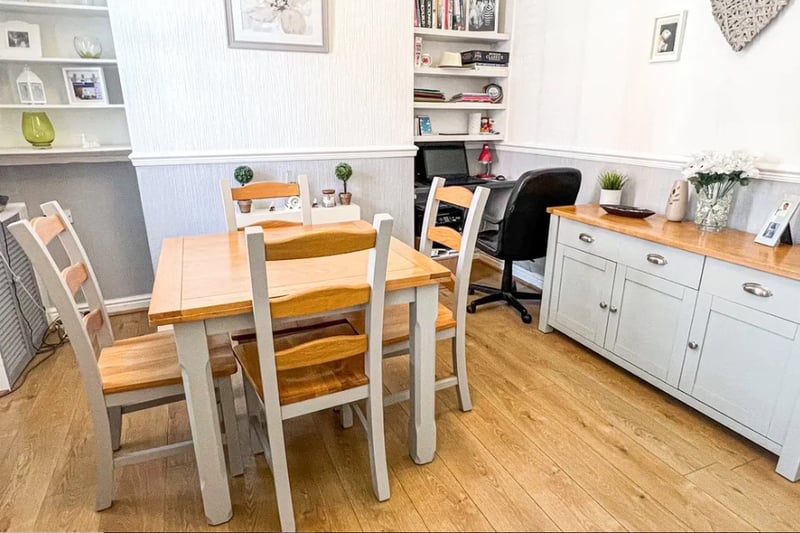 The dining room has lots of natural light and is spacious enough for a small desk for those who work from home