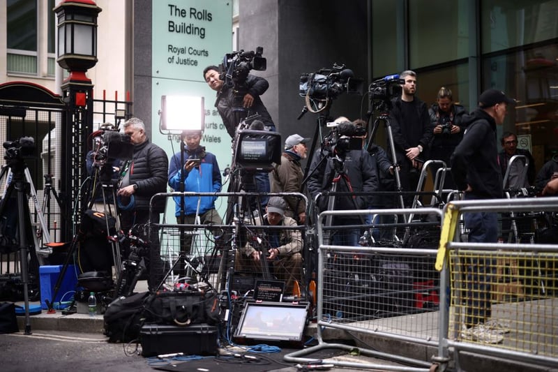Film crews outside the High Court, where Prince Harry will give evidence. (Photo by HENRY NICHOLLS / AFP) (Photo by HENRY NICHOLLS/AFP via Getty Images)