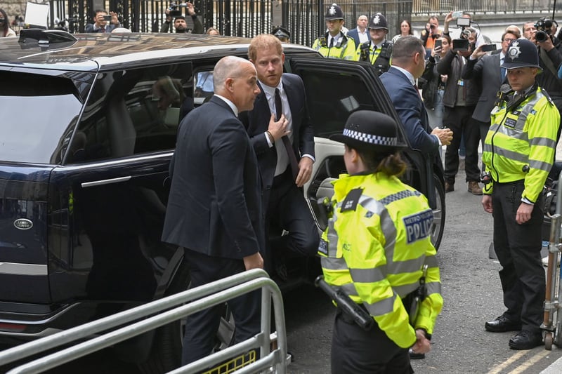 Prince Harry arrives. (Photo by Kate Green/Getty Images)
