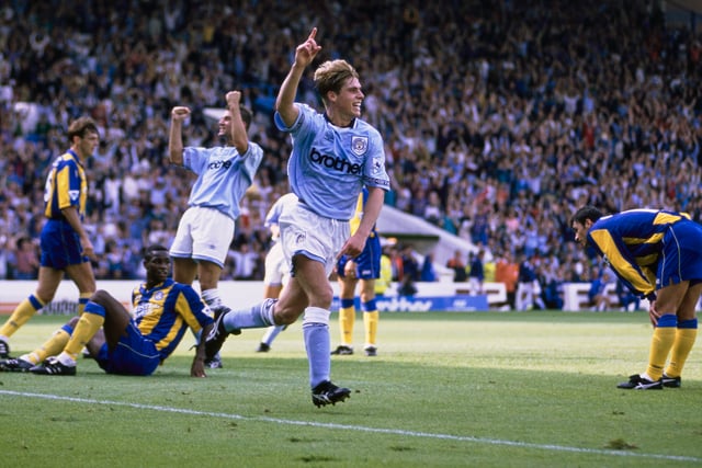 City's Gary Flitcroft celebrates after scoring in a 1-1 draw FA Premier League match with Leeds United as Leeds players David O' Leary, Chris Fairclough (floor) and Gary Speed (r) react at Maine Road on August 14, 1993 in Manchester, United Kingdom. (Photo by Steve Munday/Allsport/Getty Images/Hulton Archive)