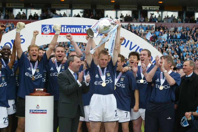 City captain Stuart Pearce lifts the First Division Championship Trophy after the Nationwide First Division game between Manchester City and Portsmouth at Maine Road, Manchester. DIGITAL IMAGE. Mandatory Credit: Alex Livesey/Getty Images