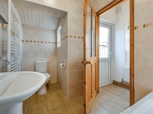 The bathroom has a modern and well presented look