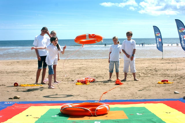 Here's a scene from 2010, showing pupils doing the Maths On The Beach challenge. Remember it?