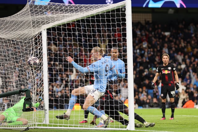 Erling Haaland scores gis and City's third during the UEFA Champions League round of 16 leg two match between Manchester City and RB Leipzig at Etihad Stadium on March 14, 2023 in Manchester, England. (Photo by Catherine Ivill/Getty Images)
