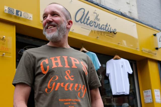 Owner and founder, Stu, models The Alternative Store's iconic 'Chips and Gravy' T-shirt.