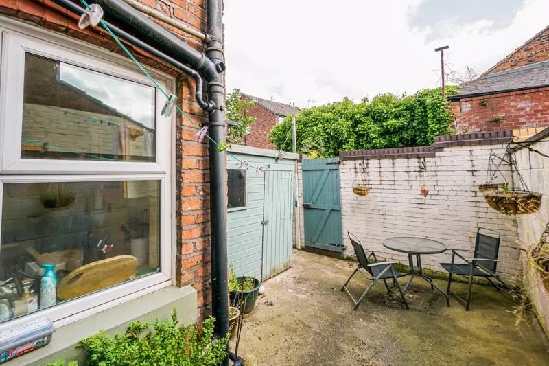 Accessed through the kitchen is the rear yard which offers an opportunities to enjoy meals and relax in the sun.