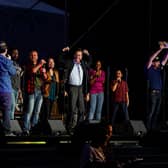 The cast of the Broadway musical “Come From Away” performs the show for free at the Lincoln Memorial in Washington, DC on September 10, 2021. (Photo by Carolyn Van Houten/The Washington Post via Getty Images)