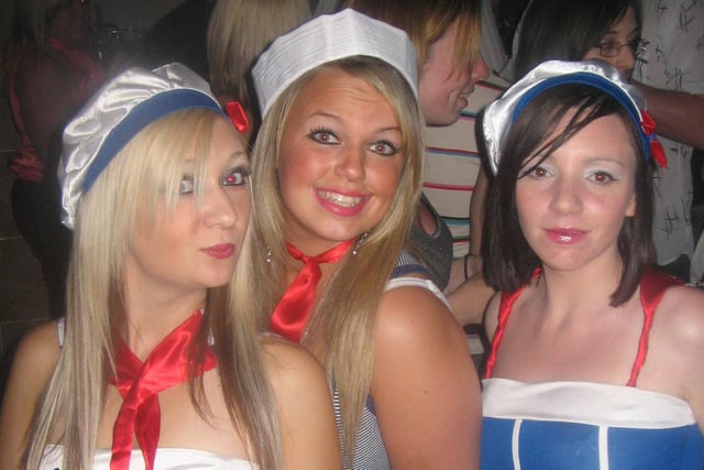 Three women in fancy dress outfits in South Shields.