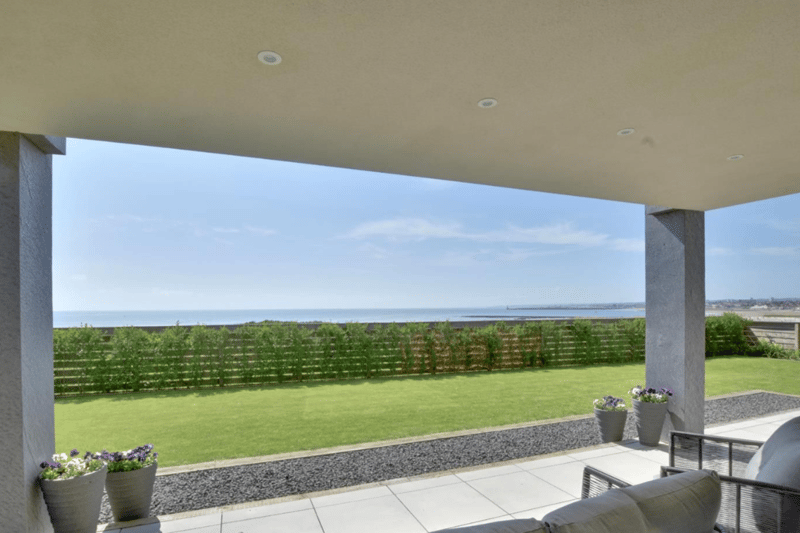 The house offers stunning views of the sea